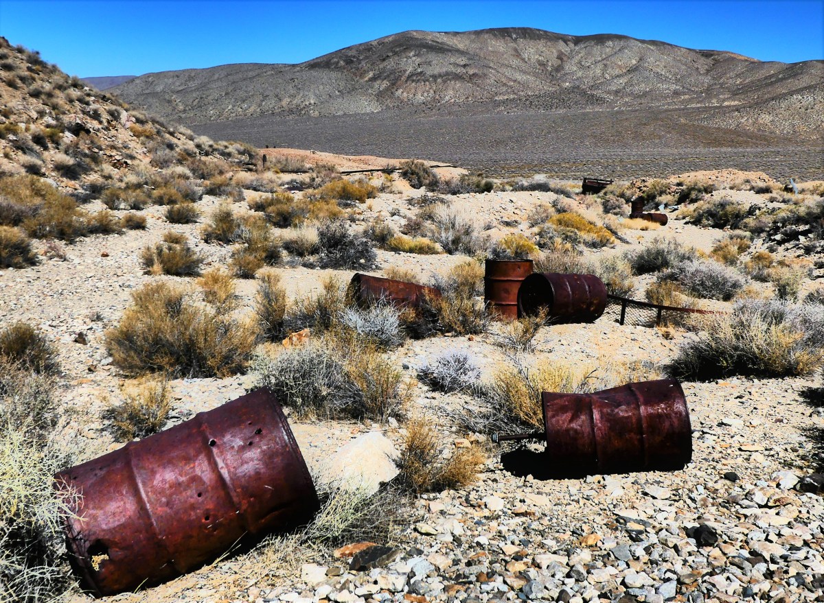 barrels on the desert floor