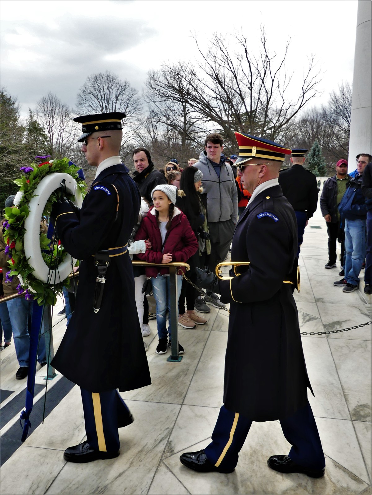 carrying the wreath